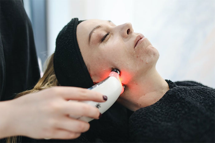 Woman getting laser treatment
